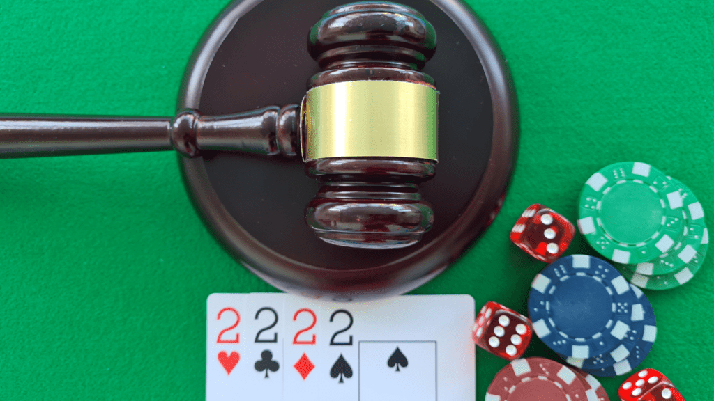 Gavel and playing cards and casino chips